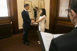 Image of couple getting married in the Thomas Hyde Room at the Victorian Marriage Registry